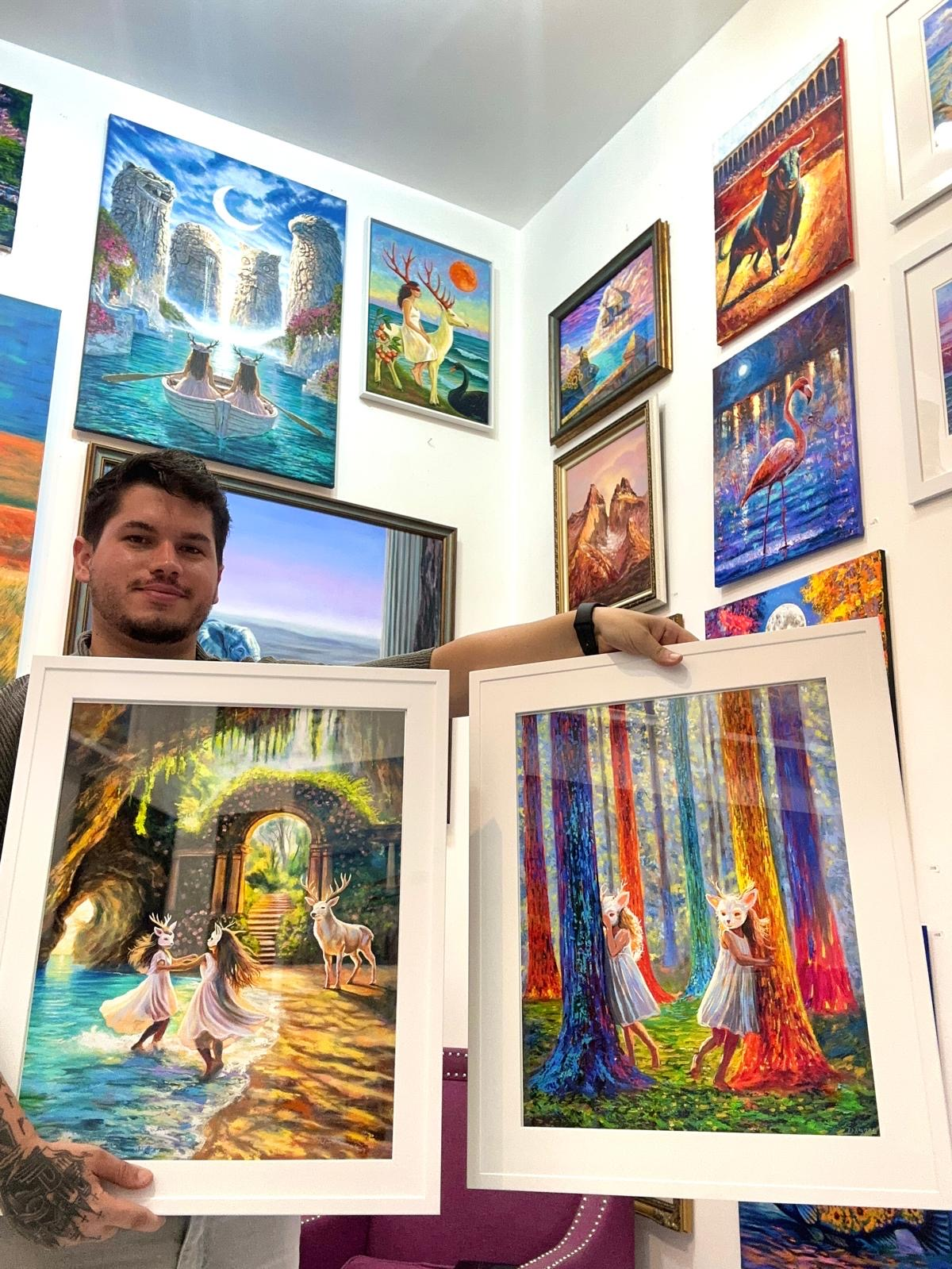 DAGOGA holding framed print references sized 16 by 20 inches